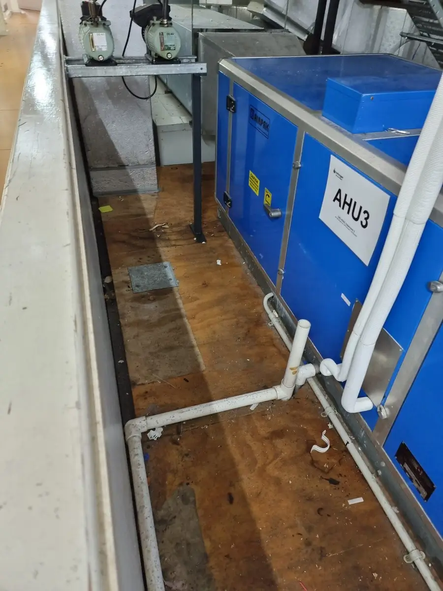 Air handling unit in the ceiling plant area during asbestos decontamination