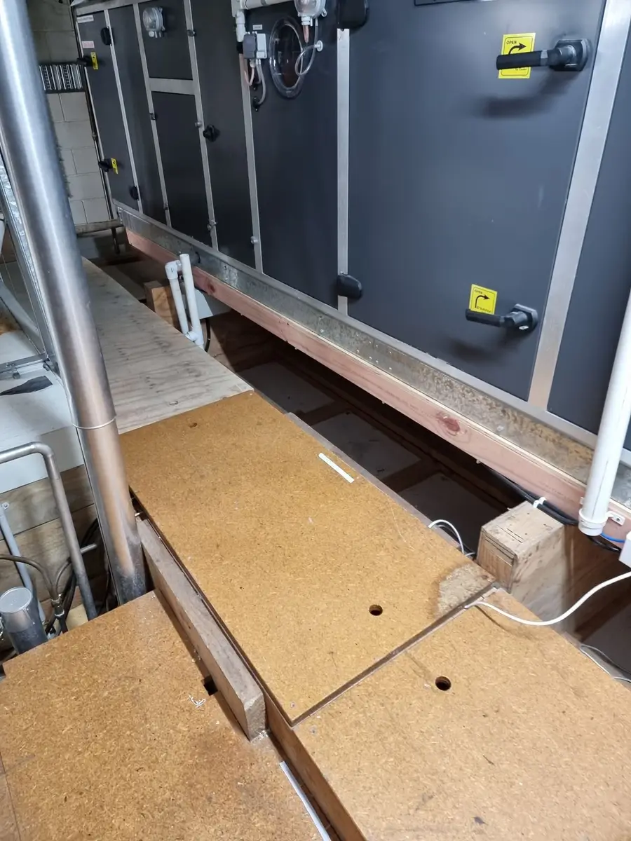 Air handling unit in the ceiling void during asbestos removal