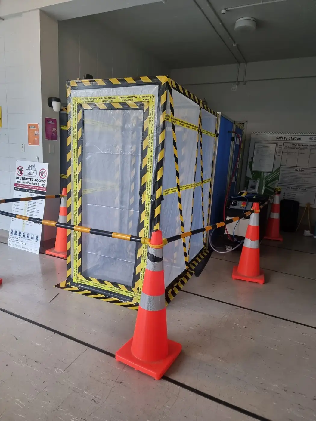 Airlock and decontamination unit set up in a commercial building for asbestos removal