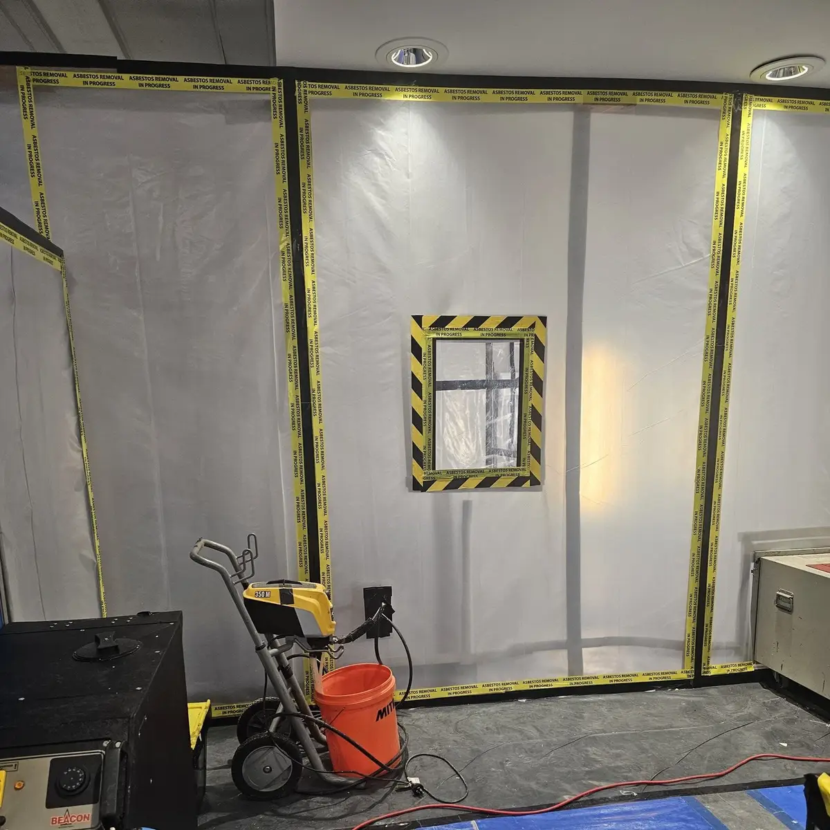 Enclosure wall and viewing window at the office fit-out asbestos removal