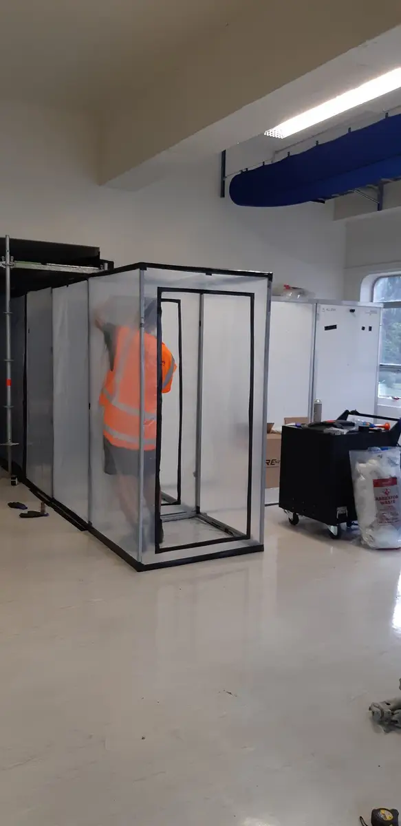 Asbestos enclosure on a warehouse floor