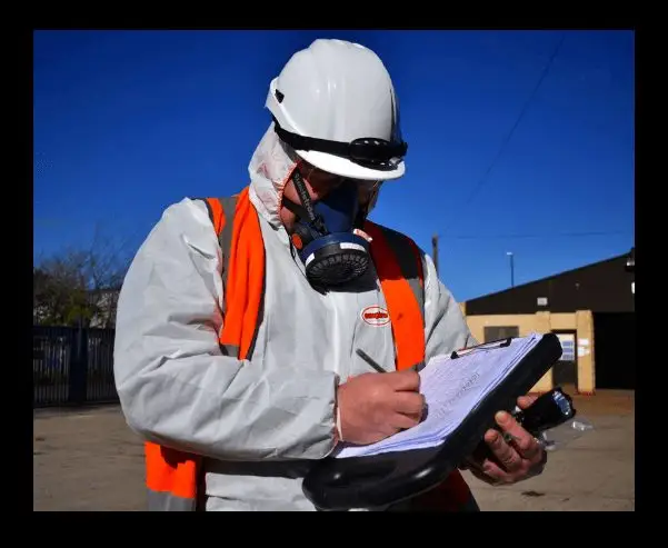 SES asbestos surveyor sampling on site
