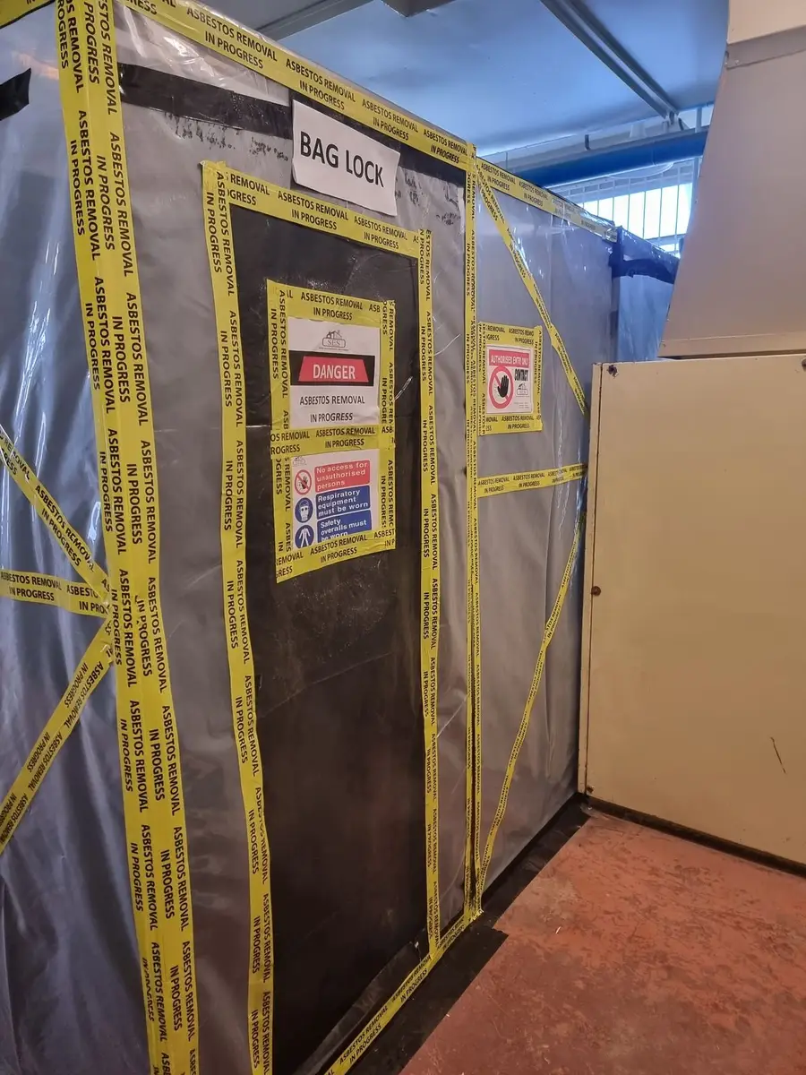 Bag lock on the plant room asbestos enclosure