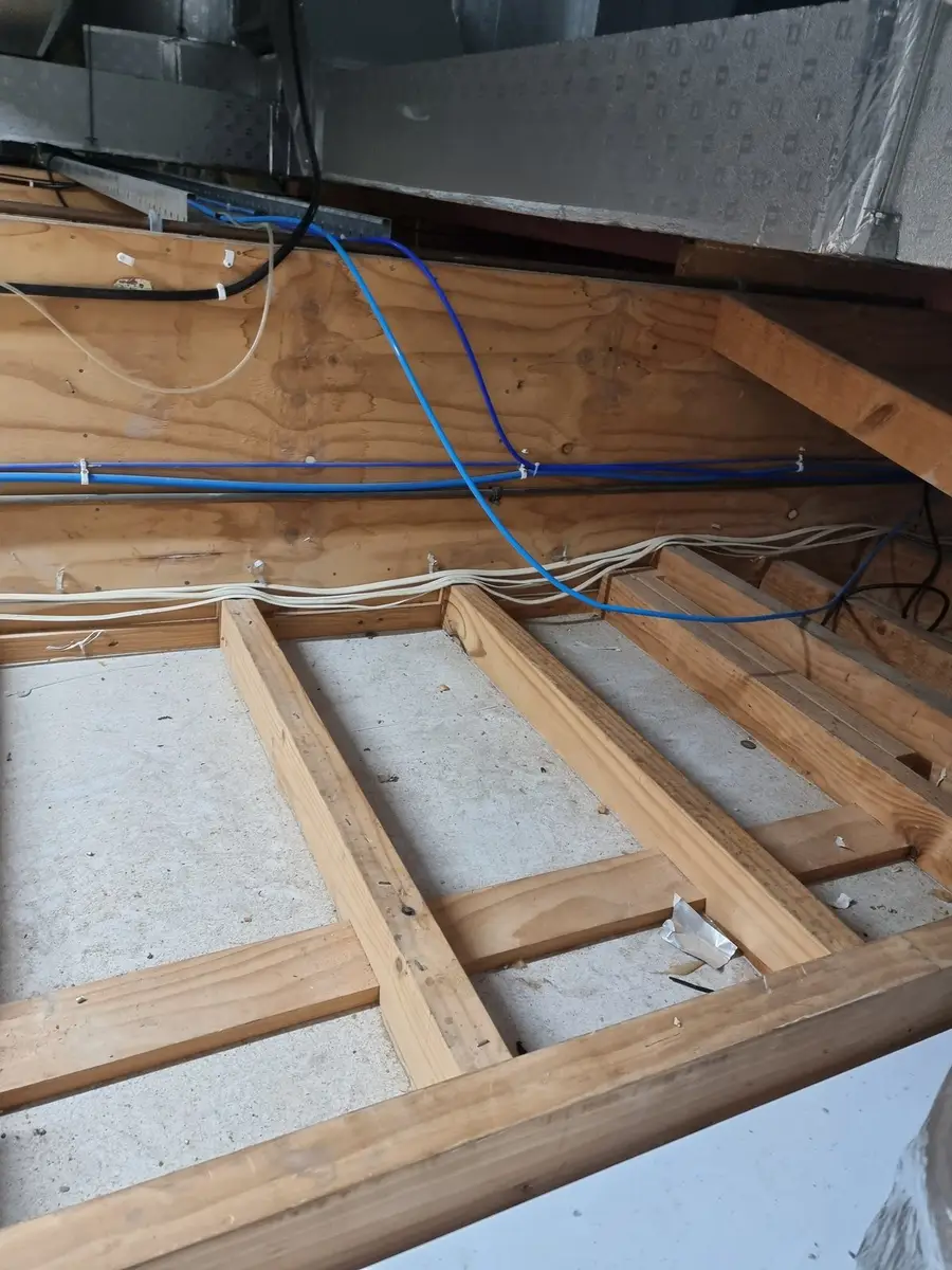 Ceiling joists during commercial asbestos decontamination