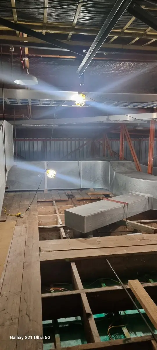 Duct junction in the ceiling void where asbestos-contaminated dust was removed
