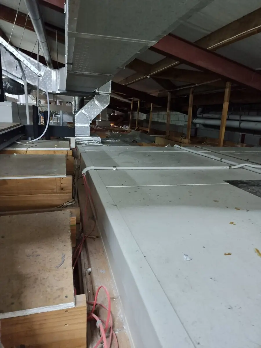 Ductwork run in the ceiling void during decontamination