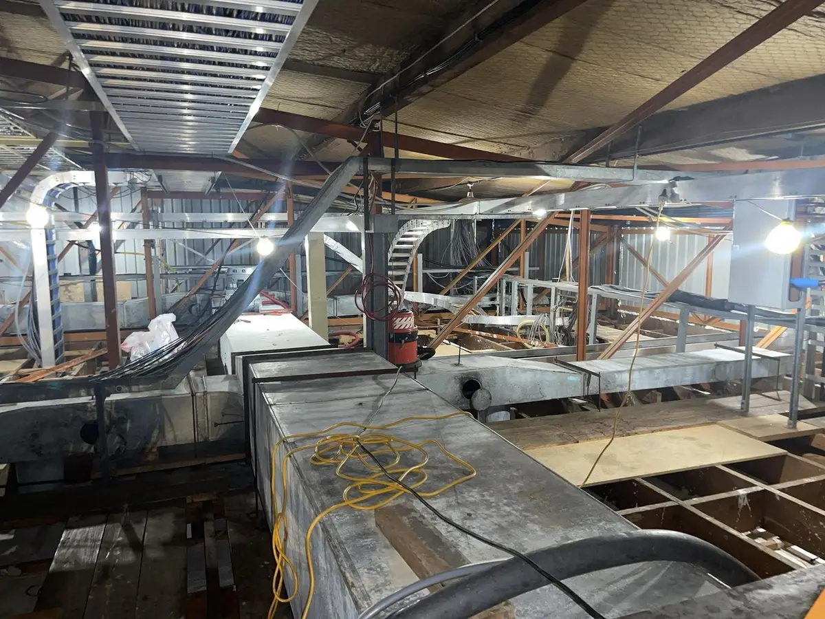 Wide view of ductwork and structure in the commercial ceiling void