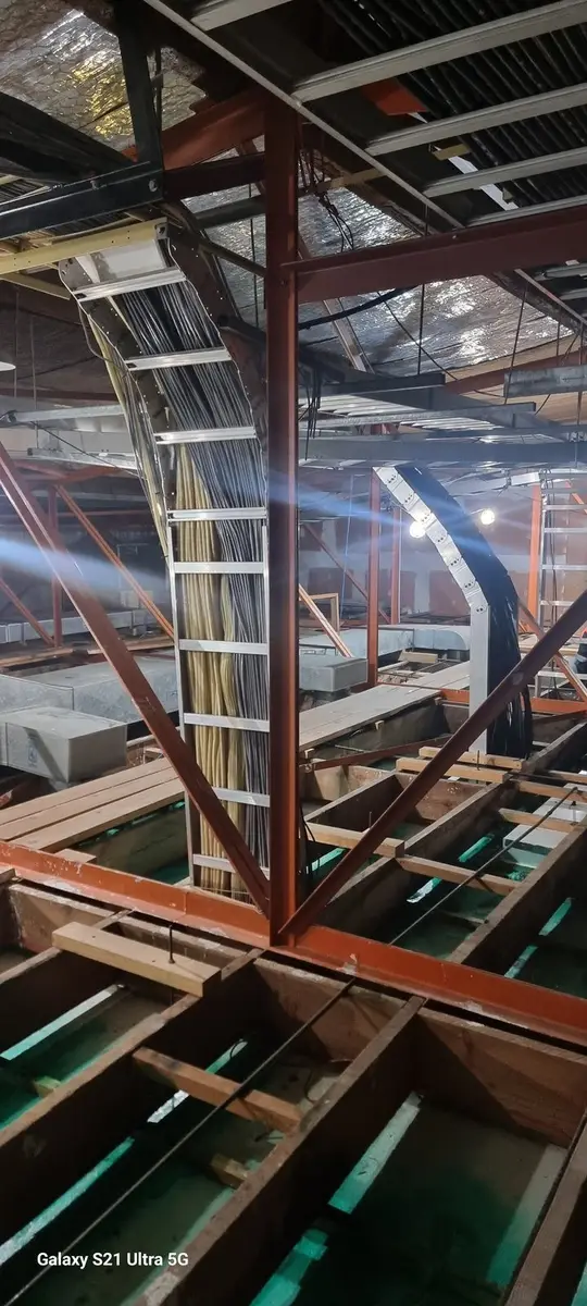 Ductwork and timber joists in the ceiling void