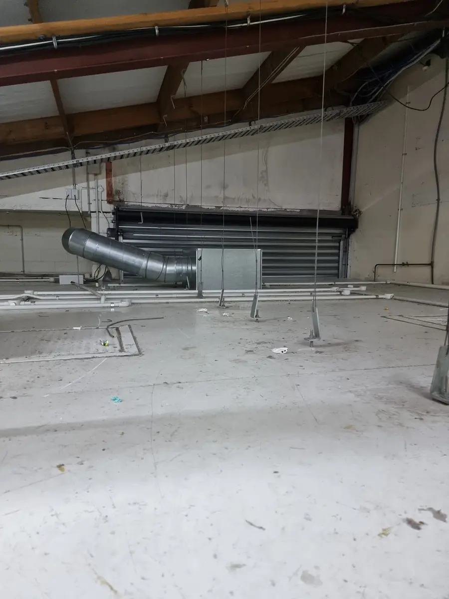 Dust contamination across the ceiling void of a commercial building