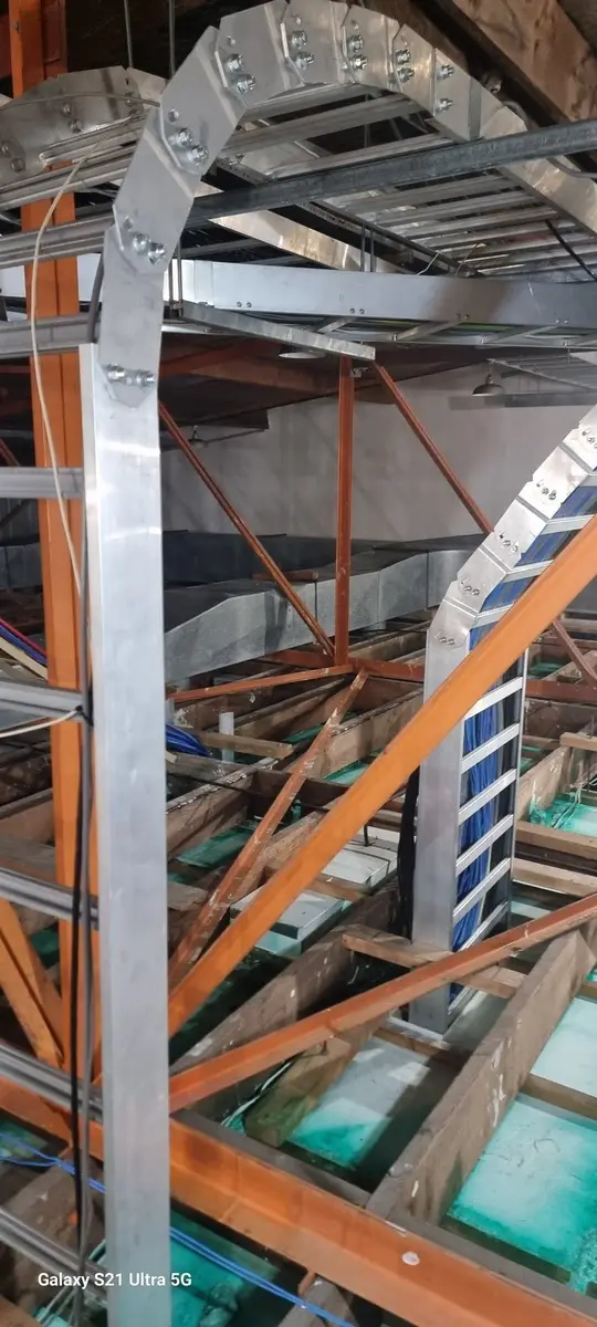 Flexible duct and cable tray in the ceiling void during asbestos works