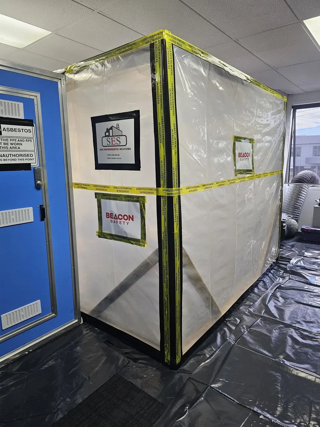 Class A asbestos enclosure built inside an occupied office in Auckland