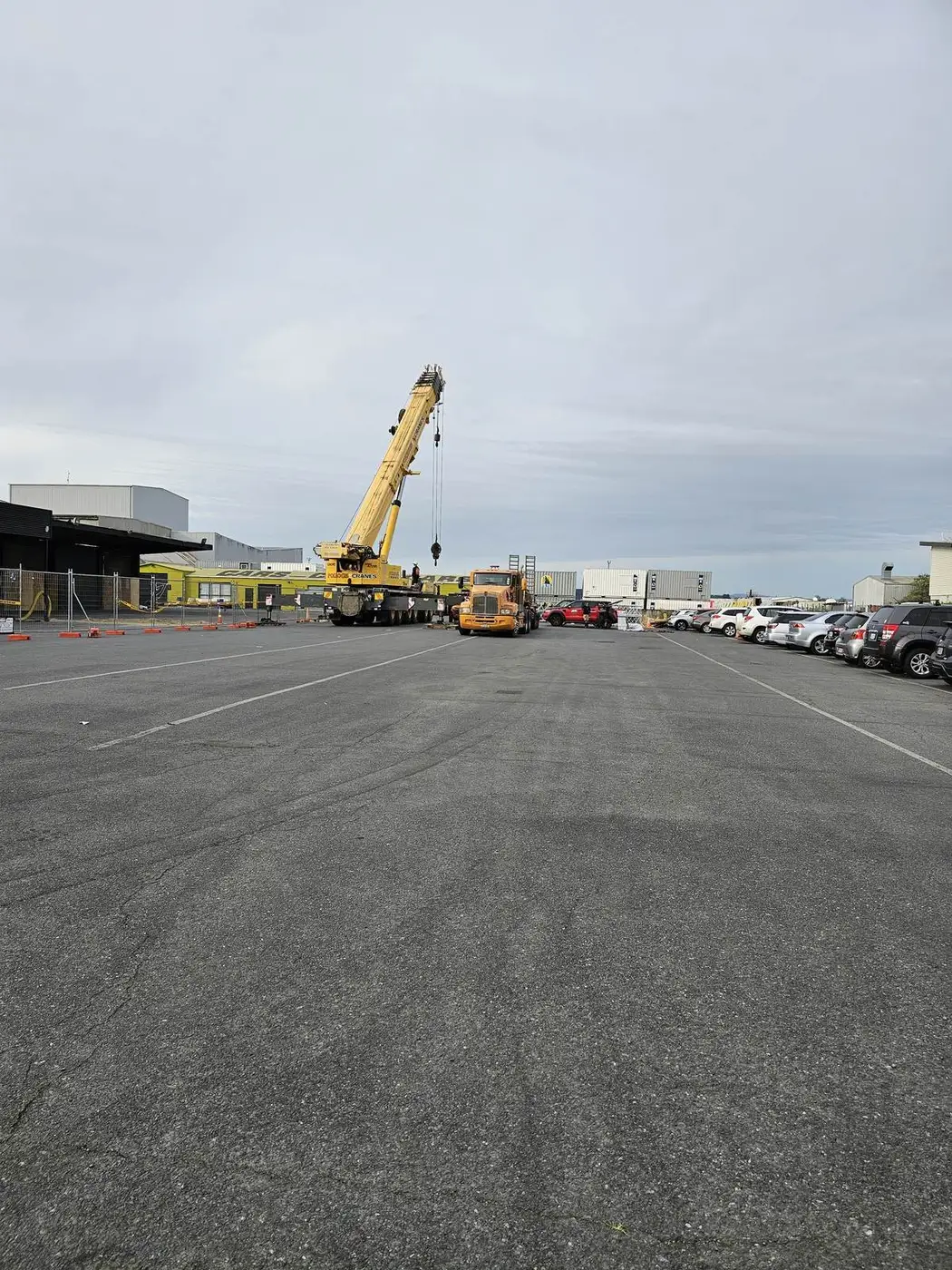 Site set-up in the car park for the commercial asbestos roof removal by crane