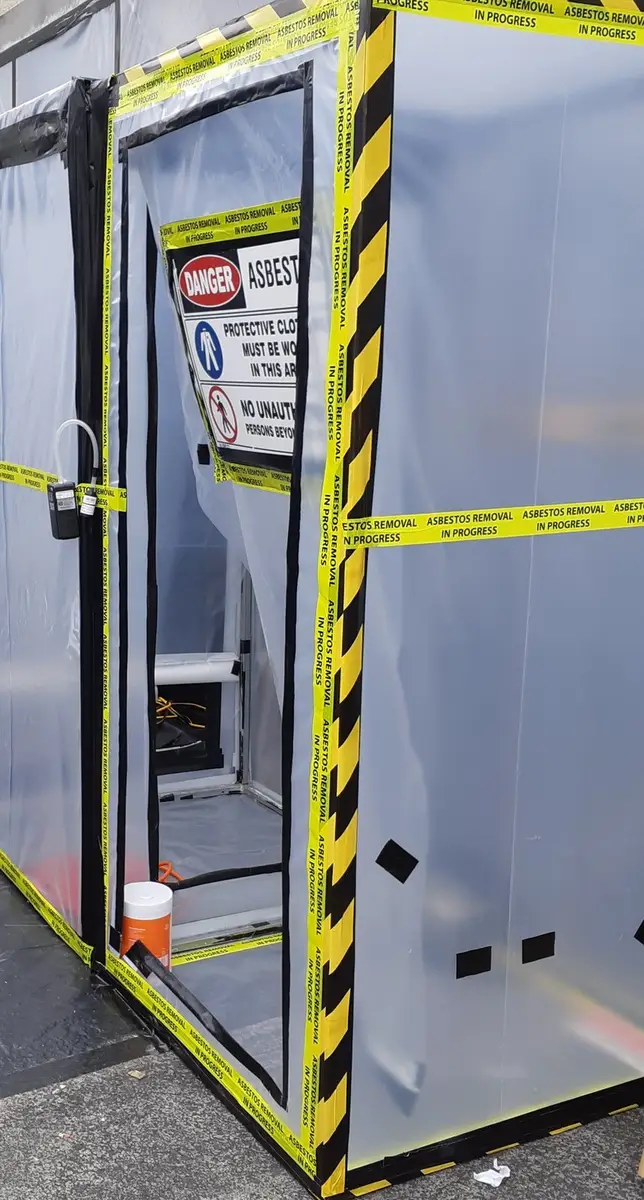 Decontamination unit at the enclosure corner