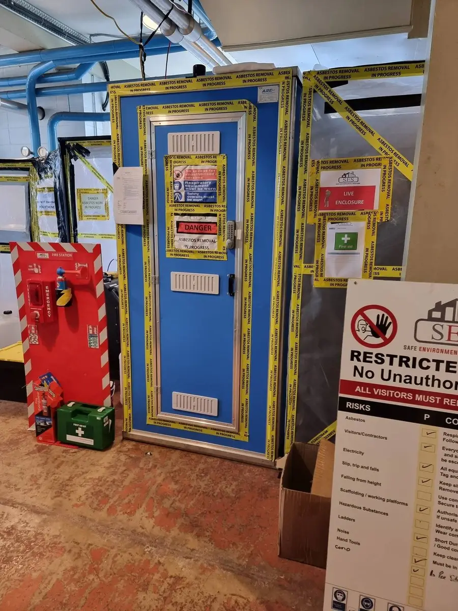 Decontamination unit with restricted access sign in the plant room