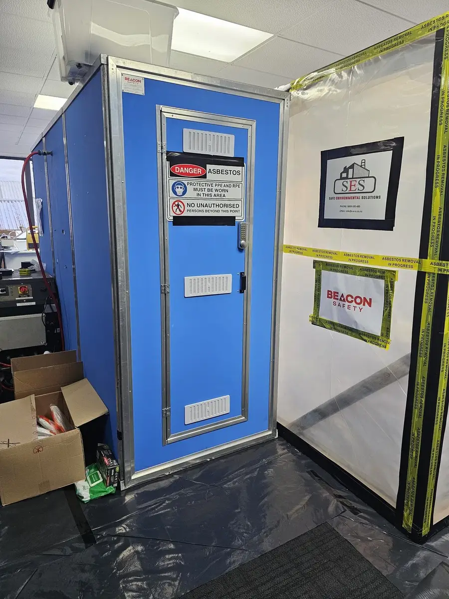 Decontamination unit door at the asbestos enclosure inside the office