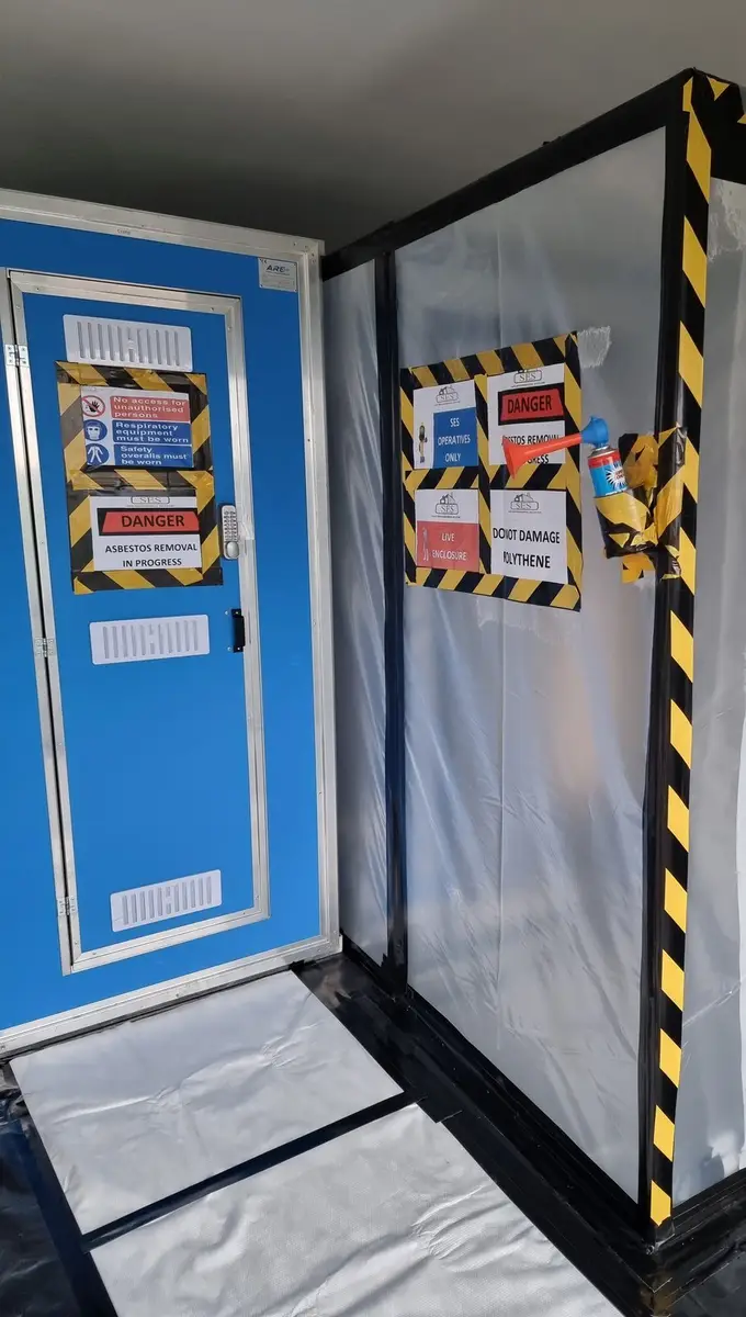 Decontamination unit door at the residential asbestos job