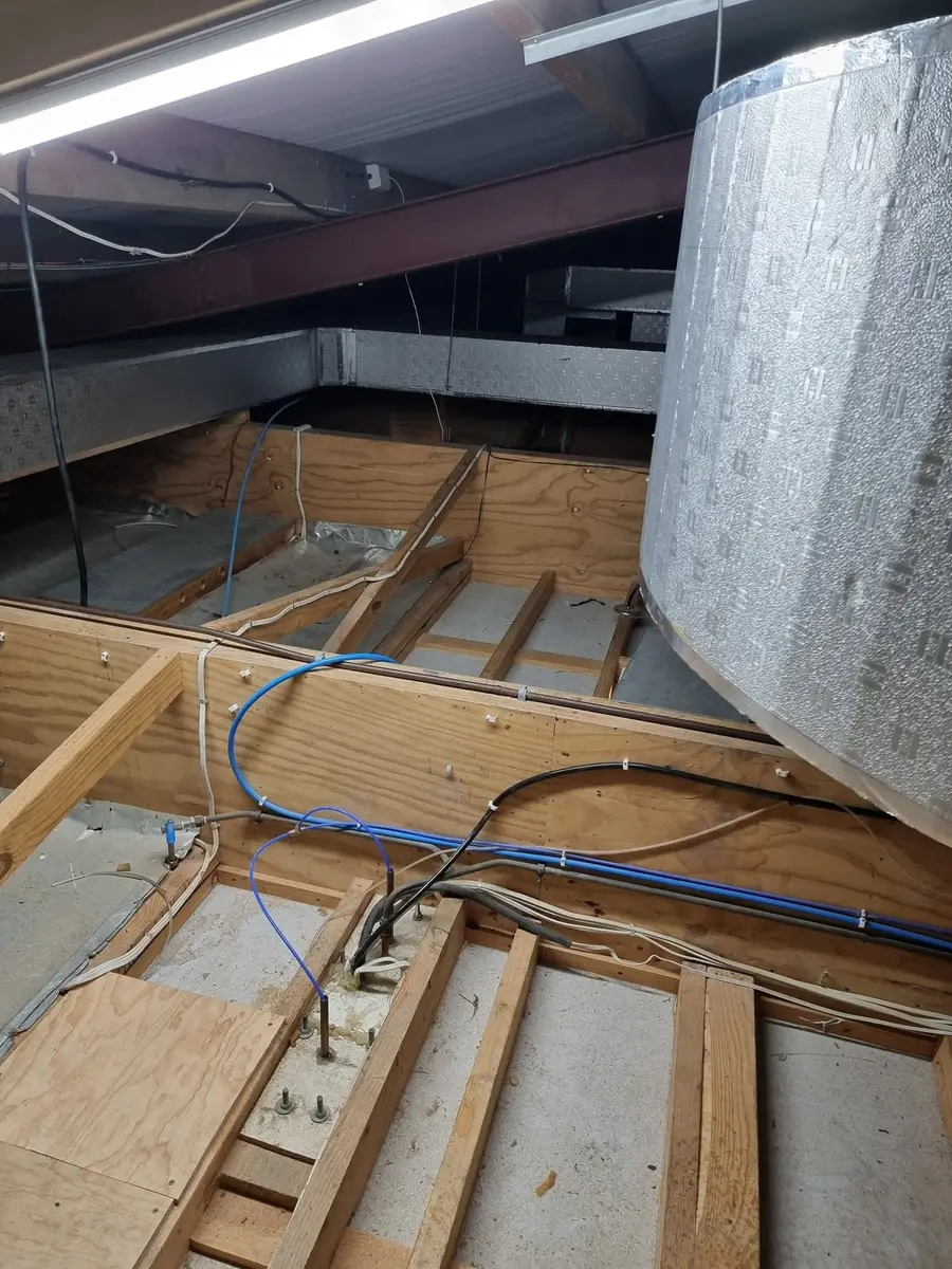 Duct and framing in the ceiling void during asbestos works