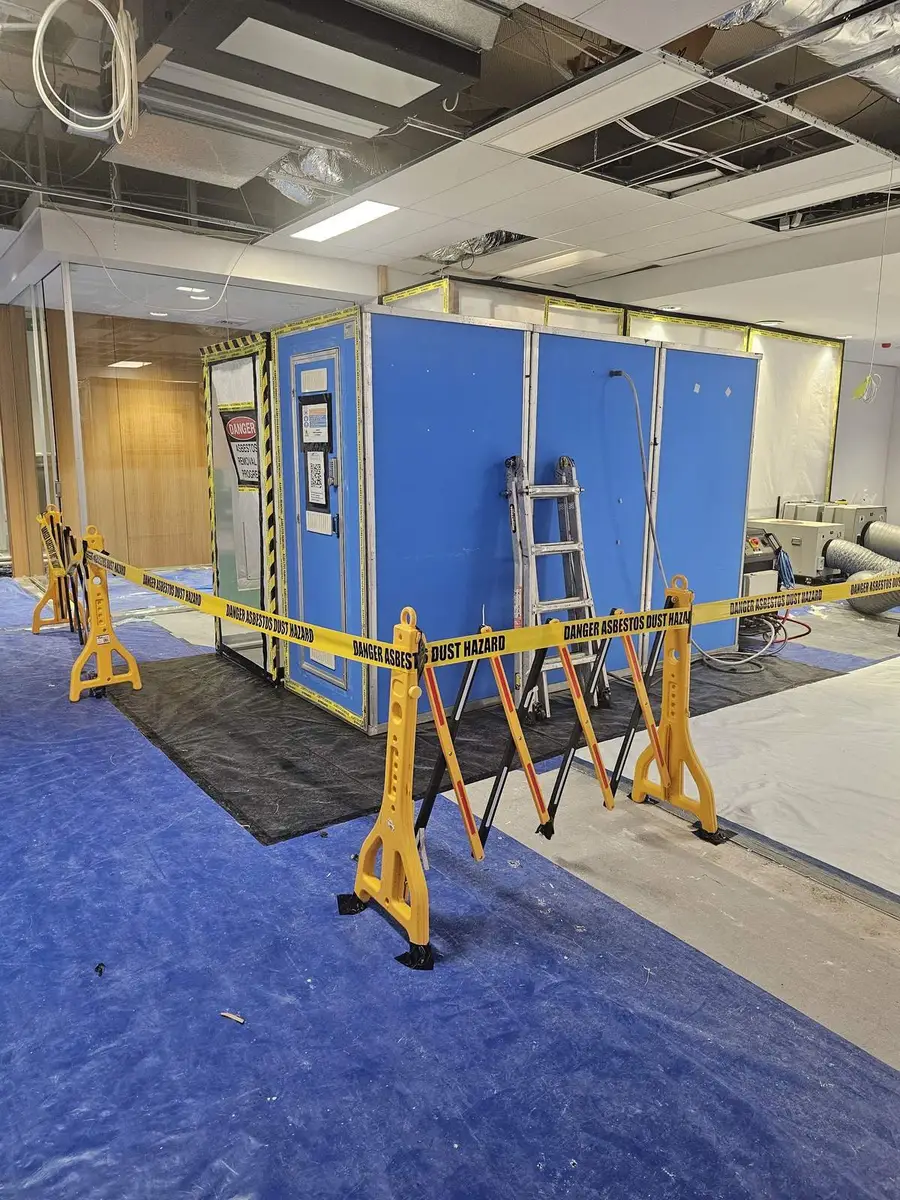 Dust hazard barrier in front of the enclosure at the office fit-out