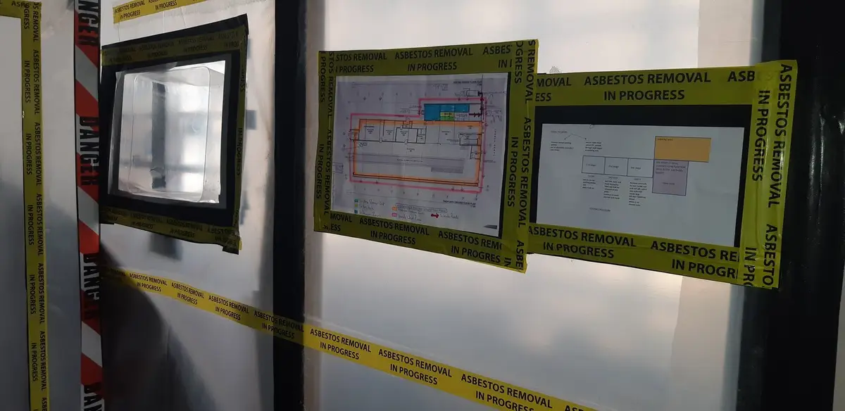 Enclosure viewing window with the control plan posted