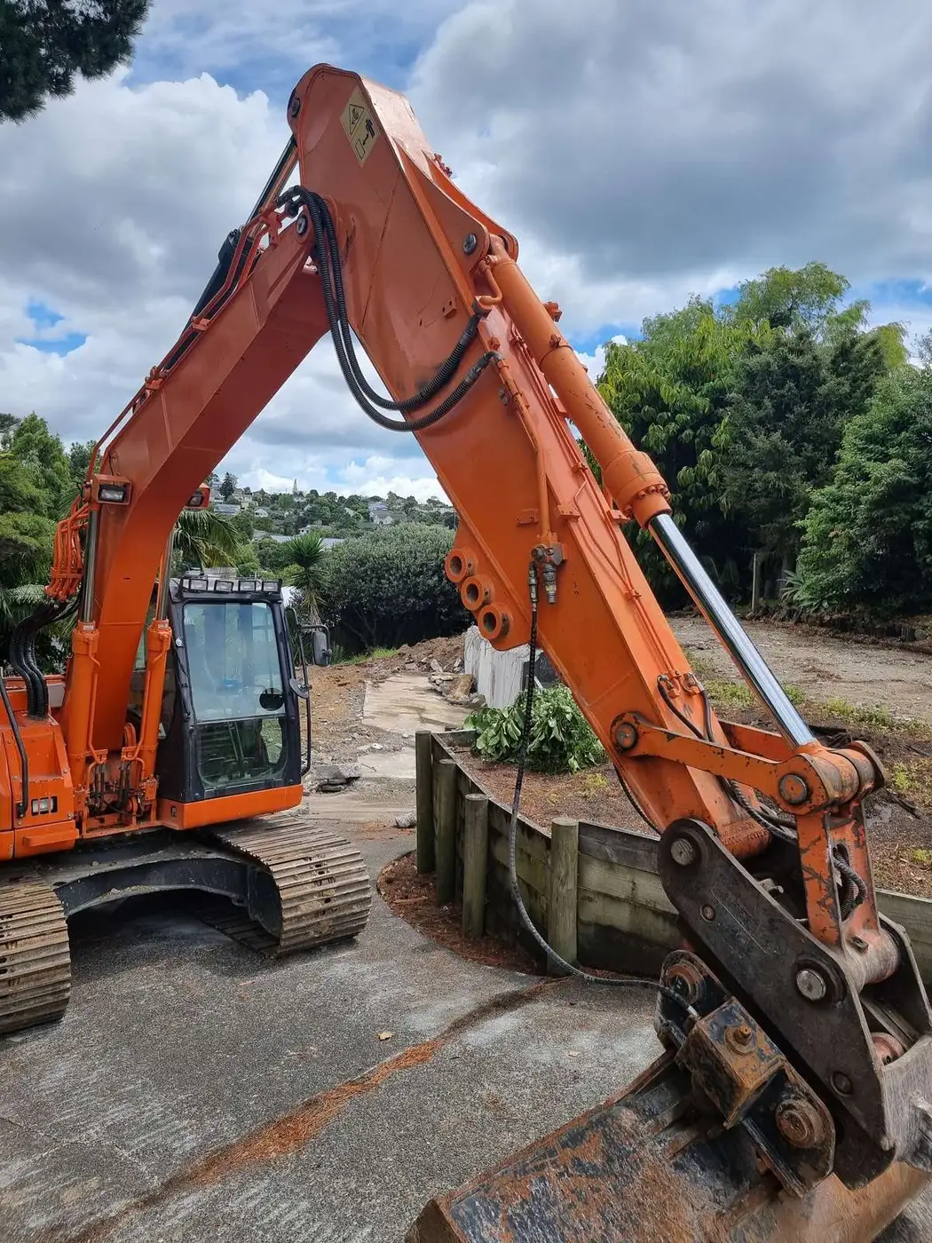 Close view of the excavator at the Auckland sub-division demolition