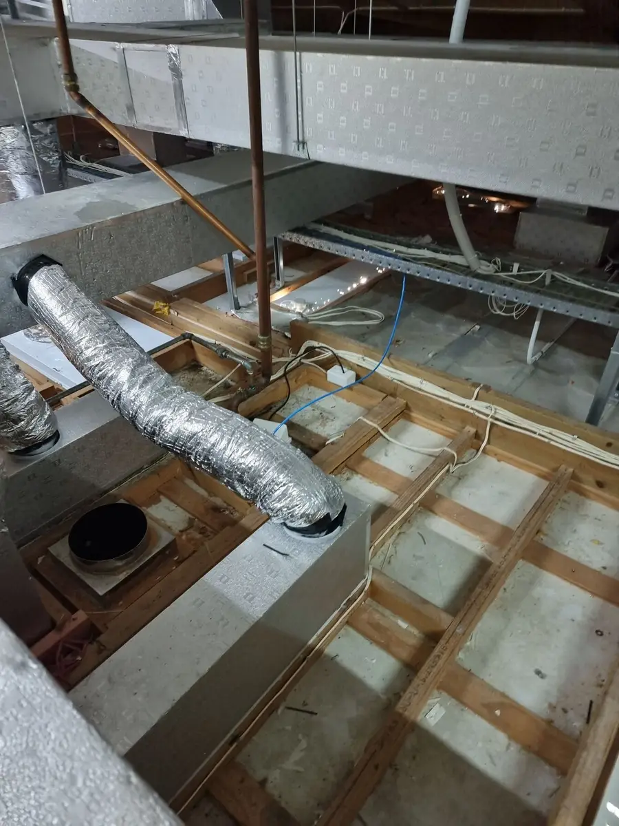 Flexible ducts in the ceiling void during asbestos removal