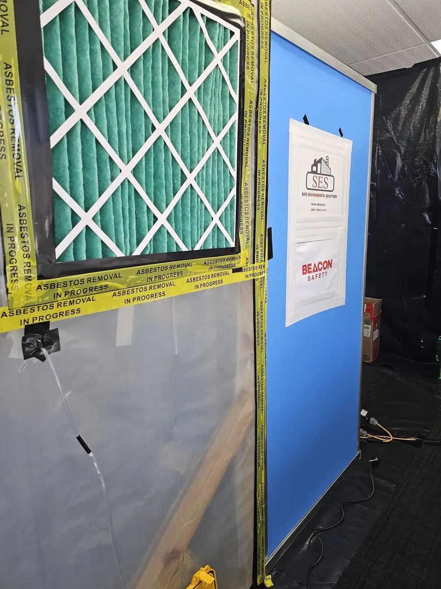 HEPA filter fitted in the asbestos enclosure wall