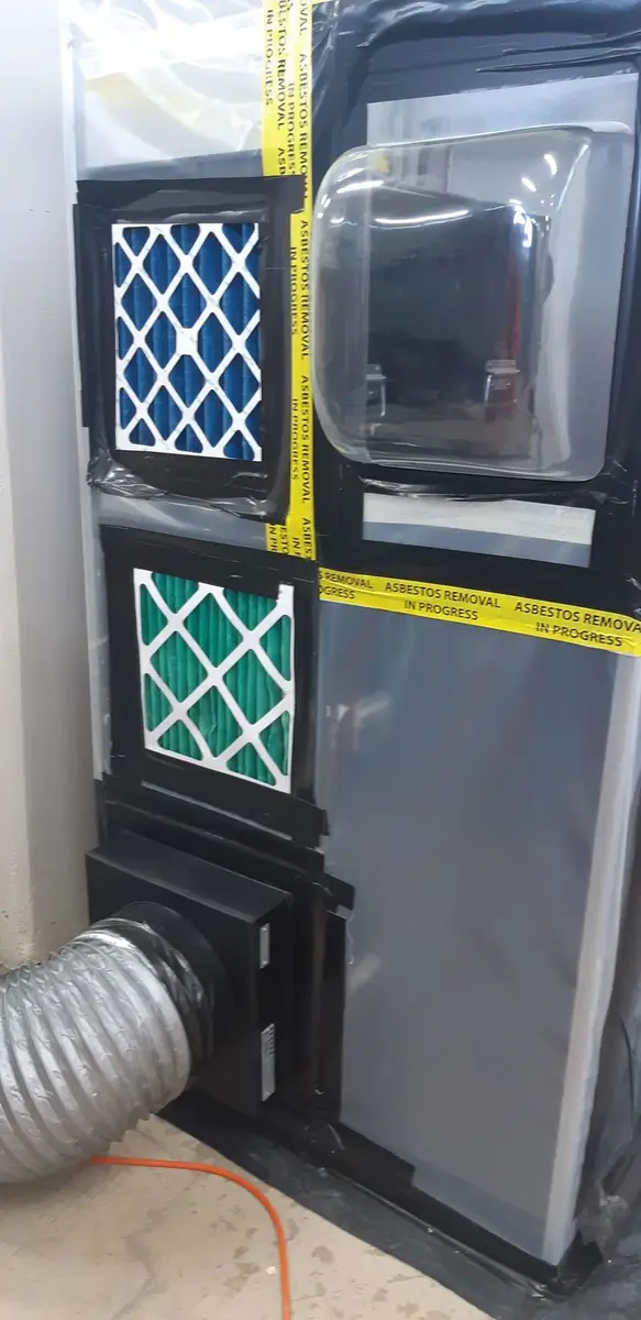 HEPA filter panels in the asbestos enclosure wall