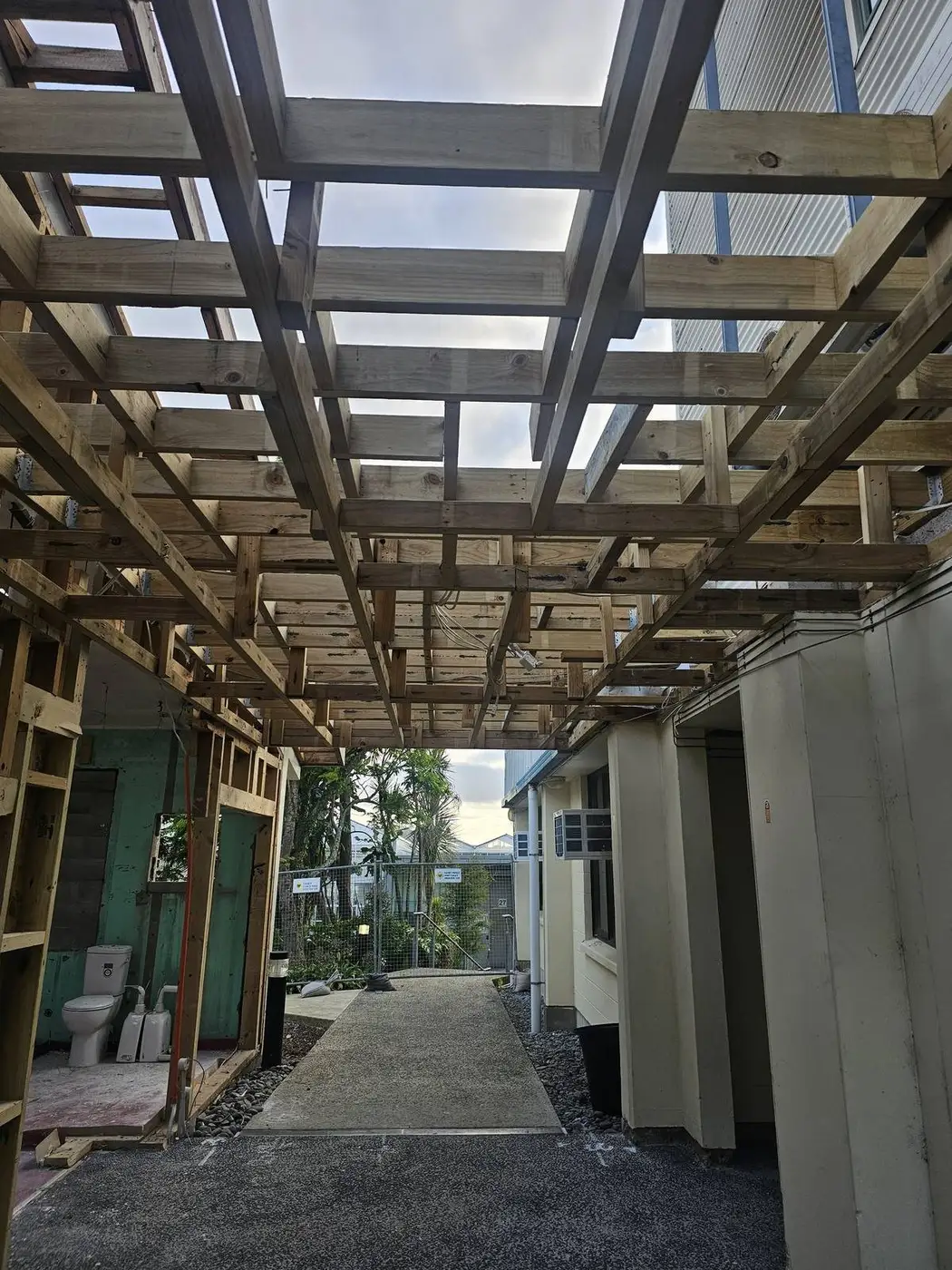 Interior framing and rafters during the house deconstruction