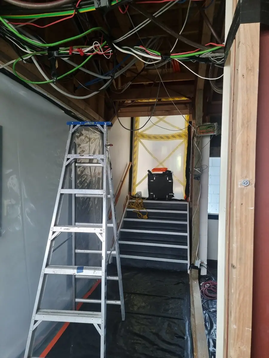 Ladder at a doorway during the office strip-out
