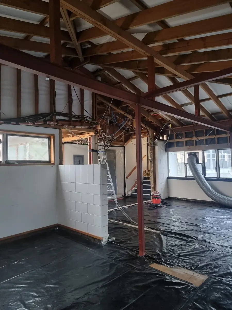 Roof trusses and partition framing during the office strip-out