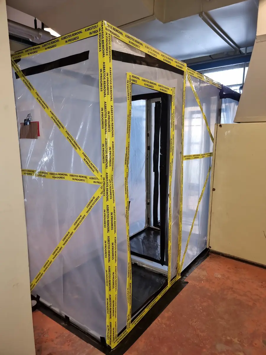 Airlock entry to the plant room enclosure for pipe lagging removal