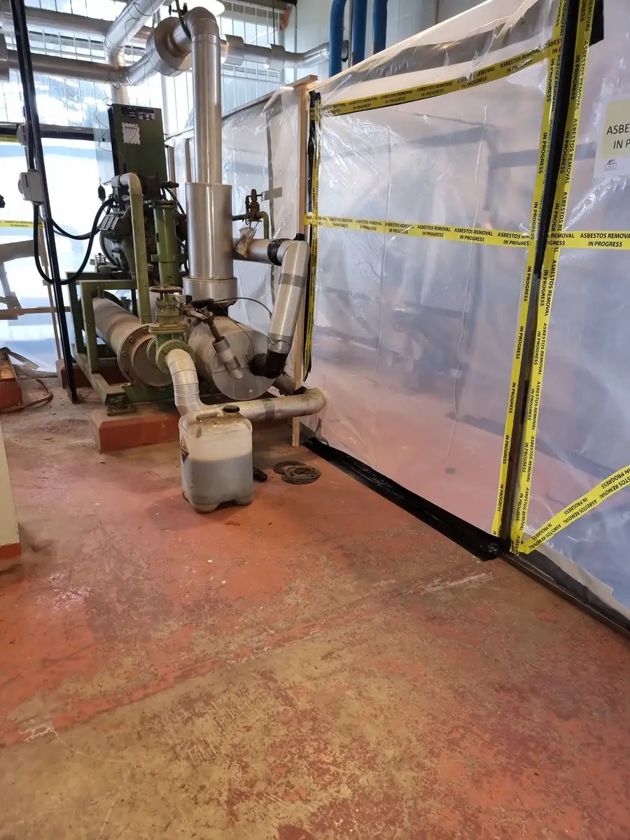 Enclosure sheeting around plant and pipework in the plant room