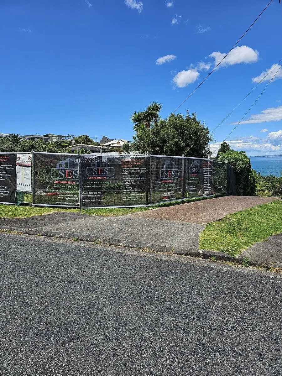 Wide view of the residential site hoarding and security fence