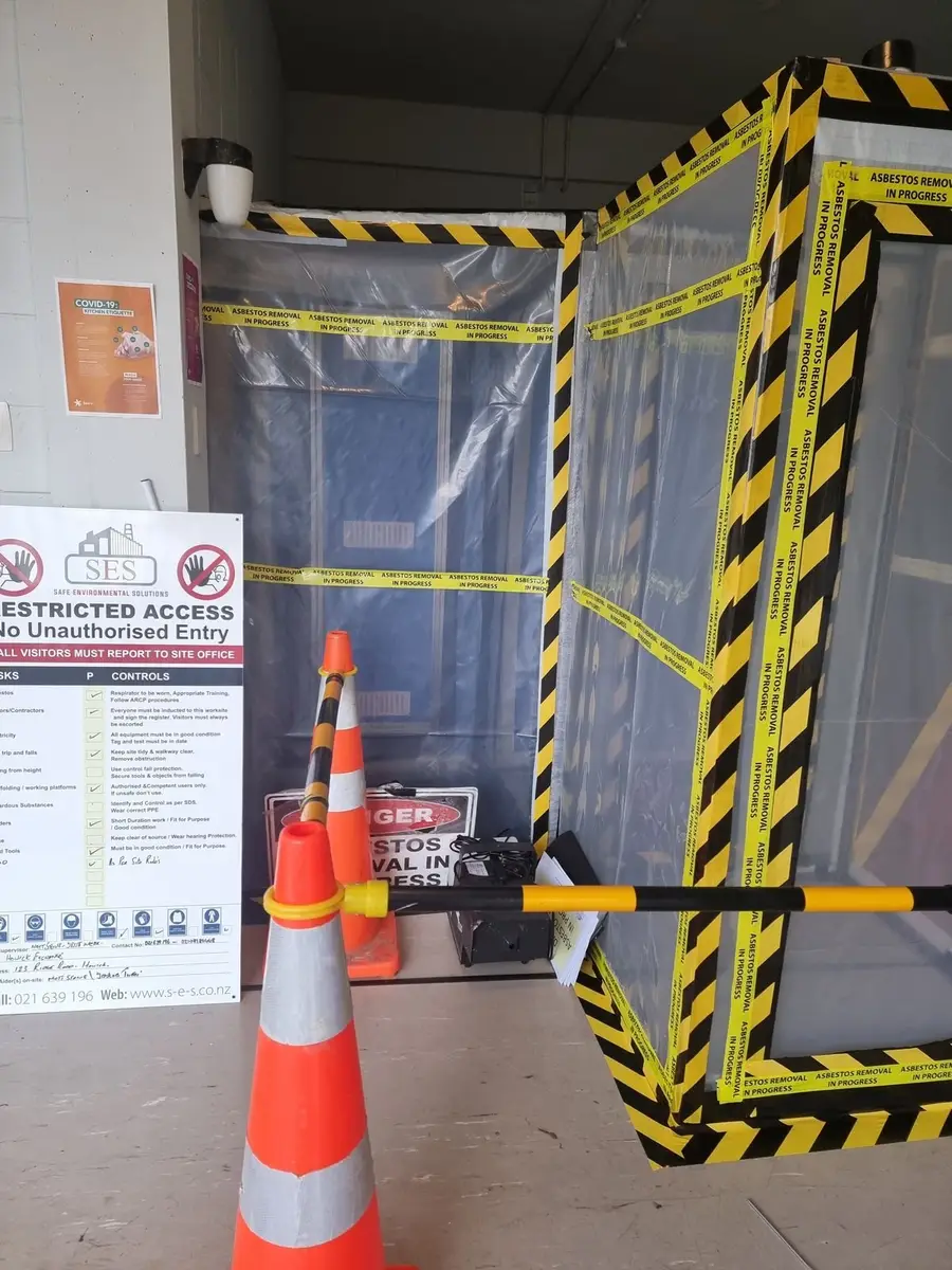 Restricted access sign at the asbestos airlock