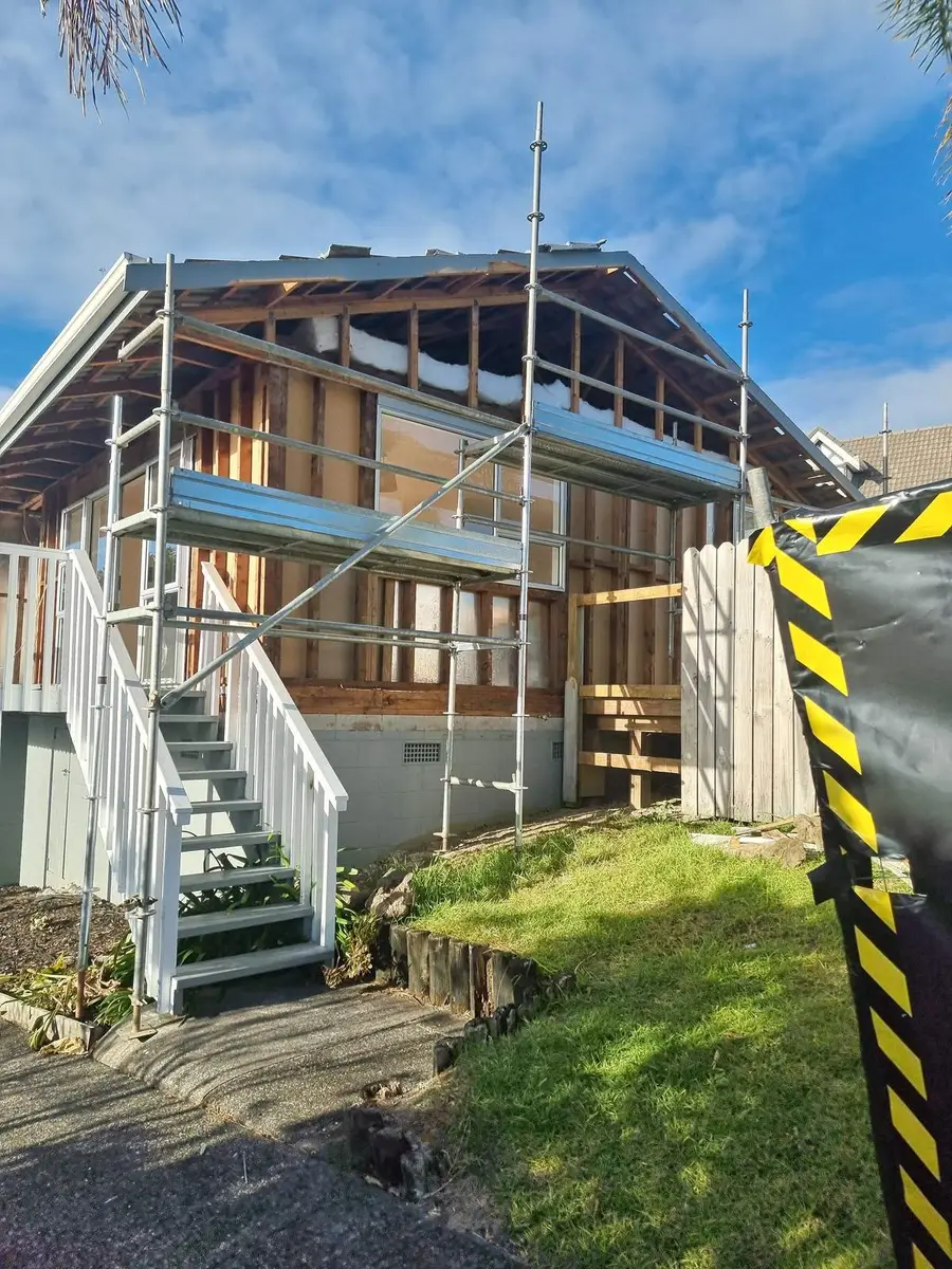 Scaffold on the two-storey house for asbestos cladding removal
