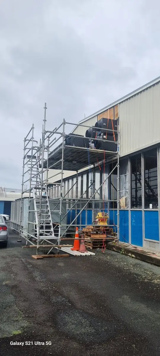 Scaffold wrap on the industrial building during asbestos removal