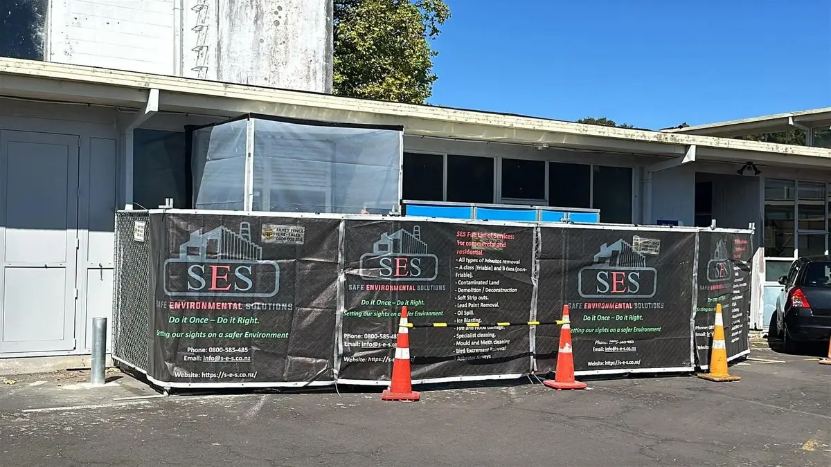 SES hoarding panels outside the commercial building during asbestos removal
