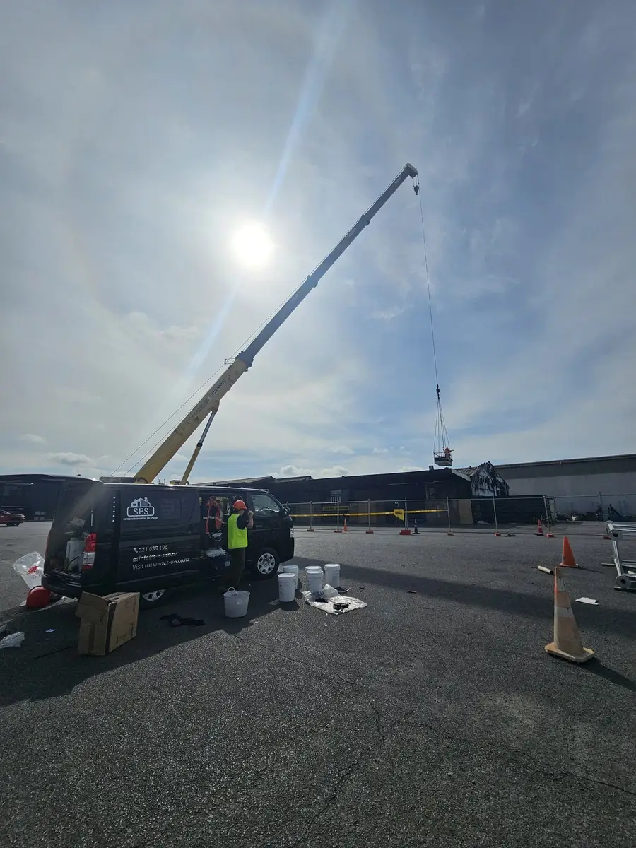 SES vehicle and crane at the asbestos roof removal site