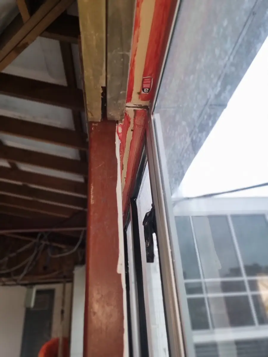 Steel column and window during the office soft-strip