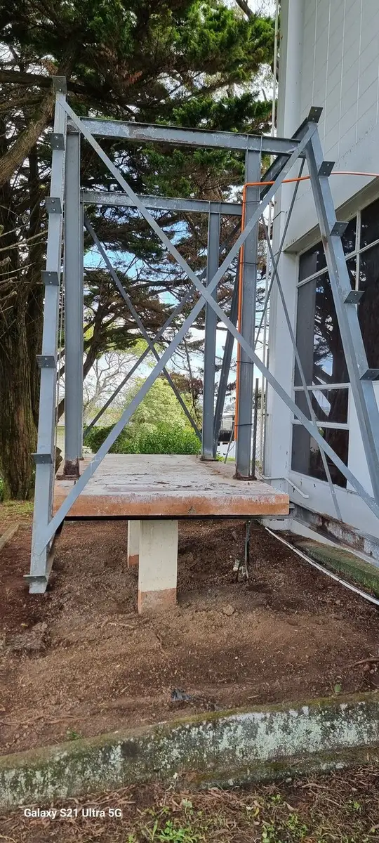 Steel support frame left standing after the asbestos-cement hood was dismantled