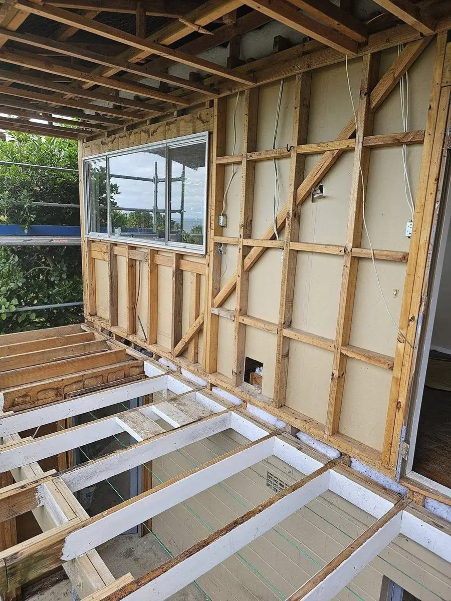 Timber framing exposed after asbestos cladding removal