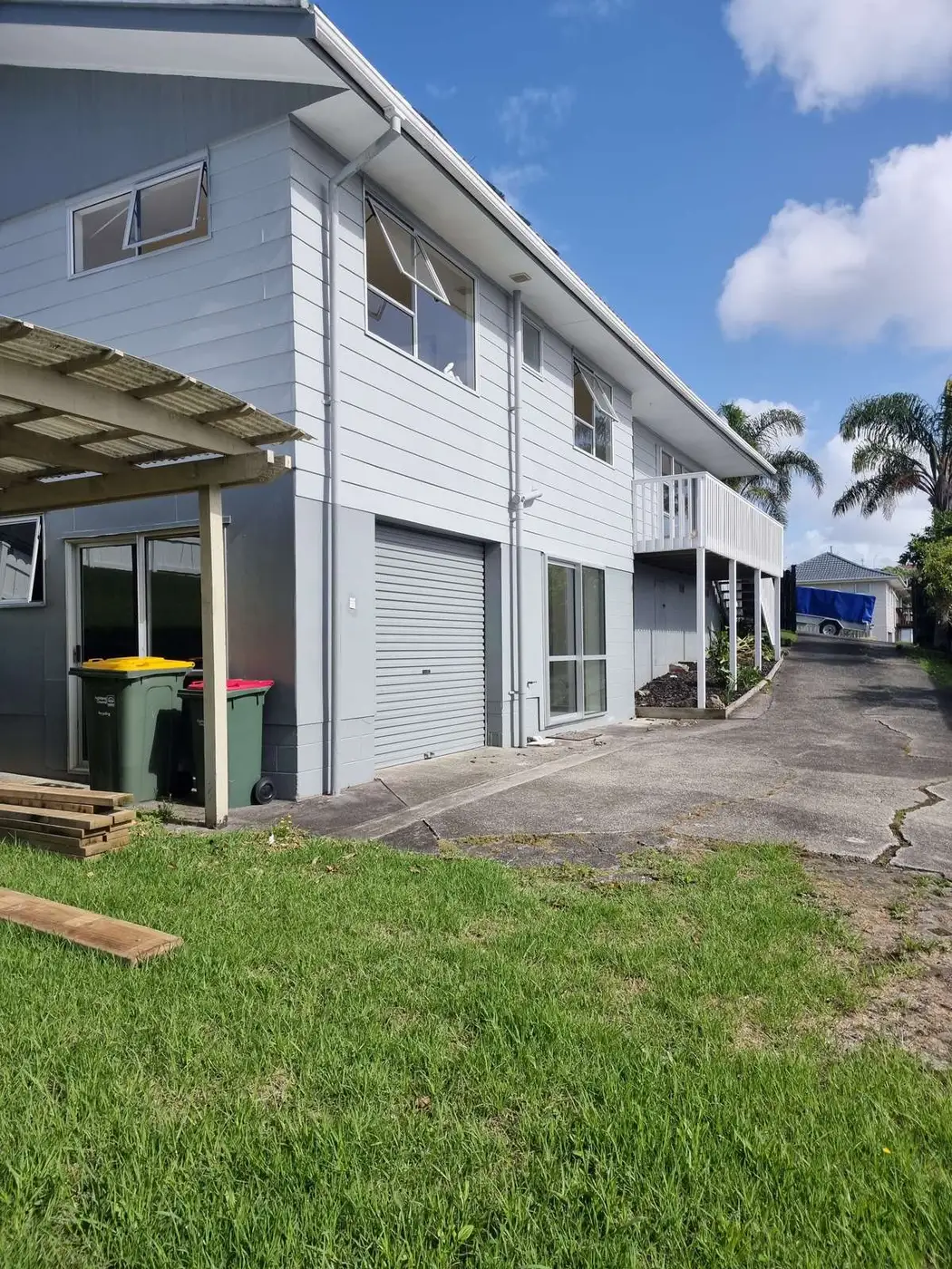 Front and carport of the two-storey house before works